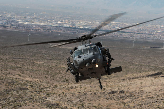 An HH-60G Pave Hawk helicopter, assigned to the 66th Rescue Squadron, flies during training on Nellis Air Force Base, Nevada, Feb. 22, 2018. (U.S. Air Force/Kevin Tanenbaum)