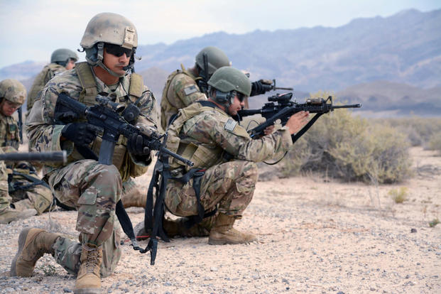 Soldiers pull security during a training exercise at Nellis Air Force Base, Nevada.