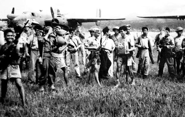 Filipino guerrillas worked with the U.S. troops across the Pacific during WWII. (Photo: U.S. Marine Corps)