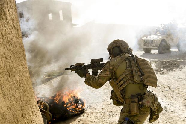 A U.S. Special Operations soldier returns fire while conducting multi-day Afghan-led offensive operations against the Taliban in Mohammad Agha district, Logar Province, Afghanistan, July 28, 2018. (U.S. Air Force/Staff Sgt. Nicholas Byers)