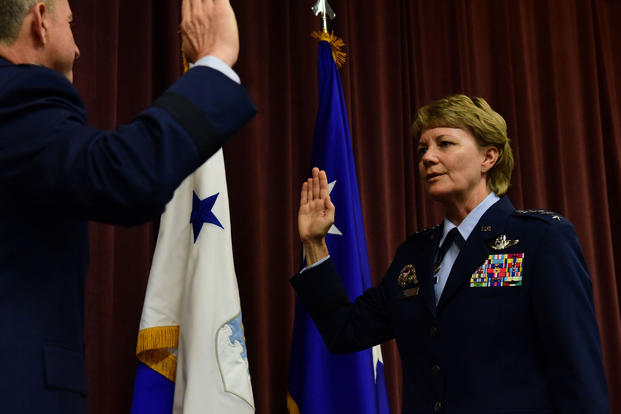 Gen. Maryanne Miller, incoming Air Mobility Command commander, receives the oath of office from Air Force Chief of Staff Gen. David L. Goldfein during a promotion ceremony at Scott Air Force Base, Illinois, Sept. 7, 2018. (U.S. Air Force photo/Michael Cossaboom)