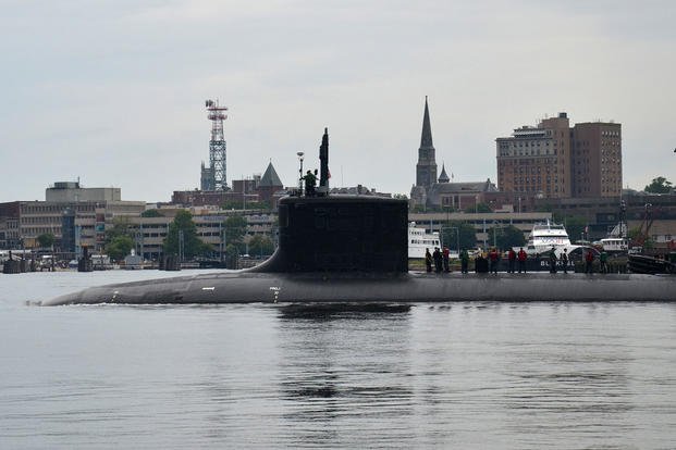 The Virginia-class attack submarine USS Virginia (SSN 774) departs Naval Submarine Base New London for a six-month deployment, August 13, 2013. (U.S. Navy photo/Jason J. Perry)