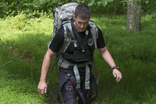 A Soldier wears an exosuit while on a three-mile outdoor course at a U.S. Army Research Laboratory facility at Aberdeen Proving Ground, Maryland. (U.S. Army/Rob Carty)