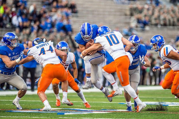 U.S. Air Force Academy -- Isaiah Sanders braces for a tackle during the Oct. 27, 2018 contest at Falcon Stadium. (U.S. Air Force/Trevor Cokley)