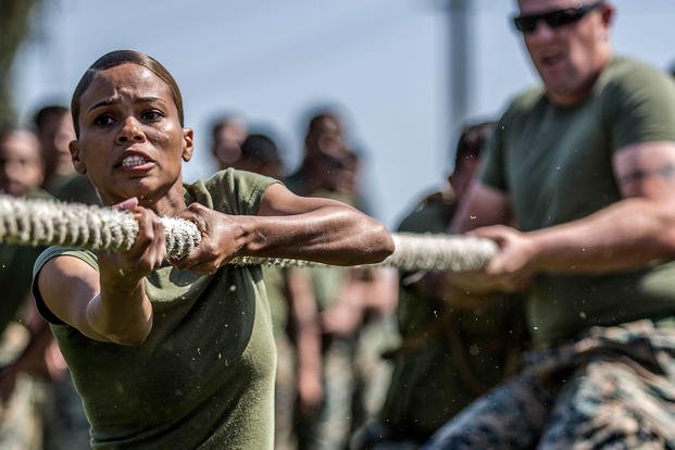 Marine Corps Sgt. Lakezia Ortiz participates in a tug-of-war competition at Marine Corps Base Camp Pendleton, Calif., April 13, 2018. Ortiz is a section chief assigned to Repairable Maintenance Company, 1st Maintenance Battalion, 1st Marine Logistics Group. Marine Corps photo by Lance Cpl. Dalton Swanbeck