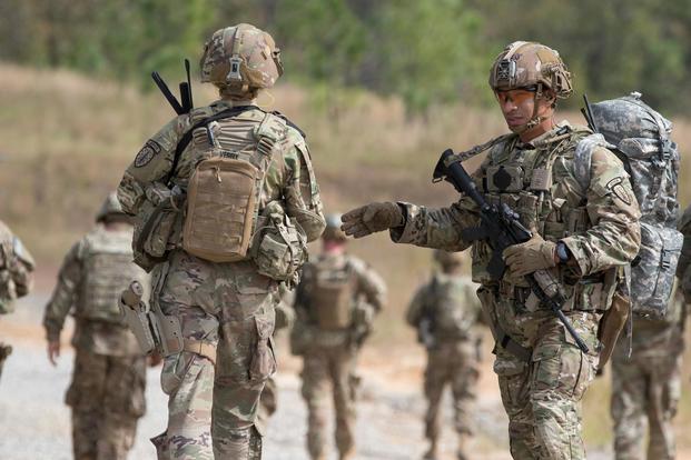 U.S. Soldiers from the 2nd Battalion, 2nd Security Force Assistance Brigade, move to a nearby village as part of a live fire exercise at Fort Bragg, North Carolina, Oct. 24, 2018. (U.S. Army/Spc. Andrew McNeil)