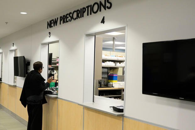 Customers drop off new prescription for filling inside the new Kittyhawk Satellite Pharmacy, Nov. 13, 2018 at Wright-Patterson Air Force Base, Ohio. (U.S. Air Force/Wesley Farnsworth)