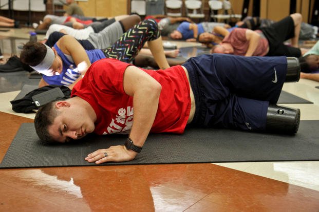Marine Sgt. Ivan Sears, a small arms technician with Wounded Warrior Battalion East, participates in yoga during the 360 Leadership Resiliency Skills Program July 27, 2017 at Joint Base Sam Houston, Texas. Sears is a bilateral double amputee, which he sustained from an improvised explosive device during a deployment to Afghanistan. (U.S. Army photo/Tomora Nance)