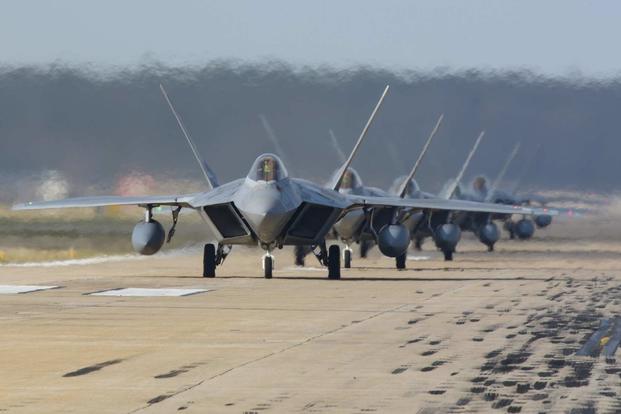 F-22 Raptors from the 1st Fighter Wing and 192nd Fighter Wing participate in a total force exercise at Joint Base Langley-Eustis, Virginia, on Feb. 28, 2019. Both wings partnered with the 633rd Air Base Wing during the Phase I exercise to showcase the readiness and deployability of the F-22s. (U.S. Air Force photo by Tech Sgt. Carlin Leslie)