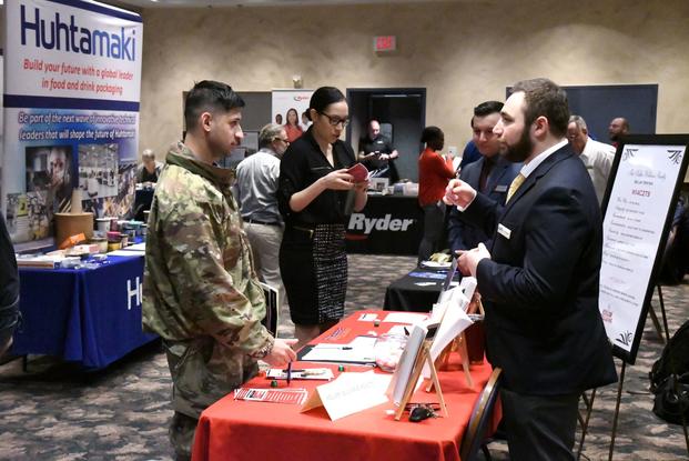 Soldiers, veterans and family members speak with representatives from dozens of employers, as well as educational institutions and veterans services Feb. 7, 2019 during a Fort Drum Soldier for Life – Transition Assistance Program career fair at the Commons. (Mike Strasser/Fort Drum Garrison Public Affairs)