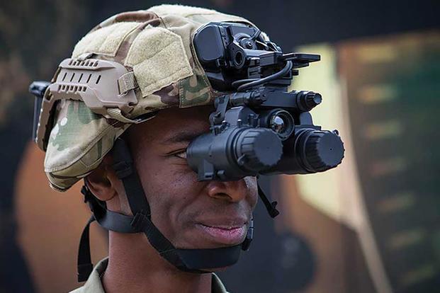 Soldier displays a prototype of the Enhanced Night Vision Goggle – Binocular. (U.S. Army)