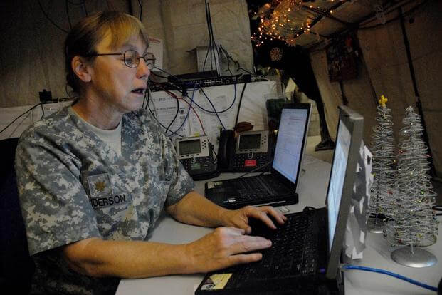 Maj. Catherine Anderson, chief nurse for the 915th Forward Surgical Team, uses MC4, an electronic healthcare record system developed by the military, at the Medical Treatment Facility at Contingency Operating Base Basra., December 31, 2009. (U.S. Army/Pfc. J.P. Lawrence)