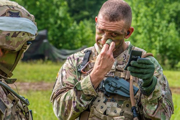 U.S. Army Forces Command’s Command Sgt. Maj. Michael A. Grinston applies camouflage face paint at Fort Campbell, Kentucky, on May 22, 2018. He has been chosen as the next sergeant major of the Army. Sgt. Steven Lopez/Army