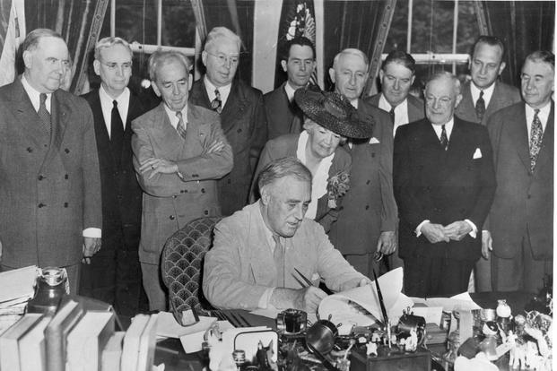 President Franklin D. Roosevelt signs the GI Bill of Rights at the White House, June 22, 1944. (Courtesy photo)