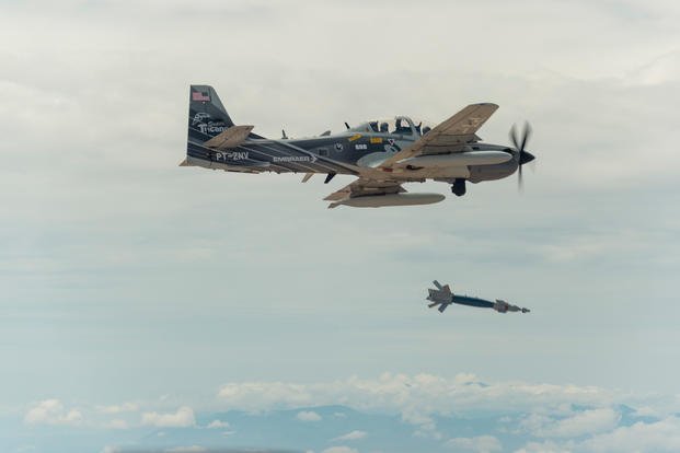 A Embraer EMB 314 Super Tucano A-29 experimental aircraft flies over White Sands Missile Range, Aug. 1, 2017. (U.S. Air Force photo/Ethan D. Wagner)