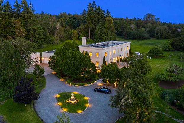 The 12,018-square-foot mansion for sale on Bainbridge Island in Washington state was once the hub for a vital World War II mission. (Image courtesy Realtor.com)
