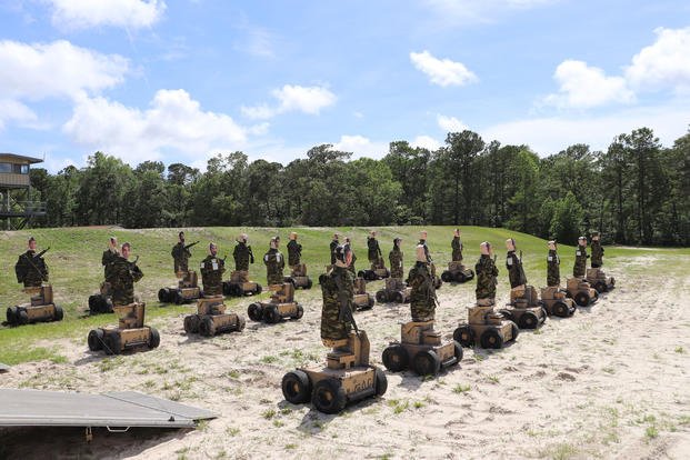 Lifelike robotic targets made by Marathon line up in formation at a military training range. Photo courtesy of Ralph Petroff/Marathon Targets
