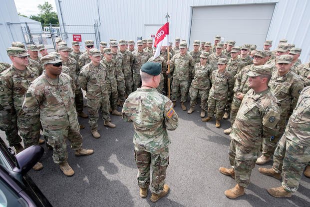 Deploying Soldiers from the 1st Squadron, 150th Cavalry Regiment, as well as other Soldiers from units who will join the 30th Armored Brigade Combat Team (ABCT), bid farewell to family and friends Aug. 25, 2019. (National Guard/Edwin Wriston)