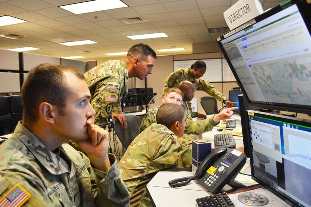 1st Space Battalion, 1st Space Brigade Soldiers train to operate the Warfighter Assisting Low Earth Orbit Tracker, or WALT, antenna and Kestrel Eye Ground Station at the U.S. Army Space and Missile Defense Command/Army Forces Strategic Command headquarters. (U.S. Army/Jason B. Cutshaw)