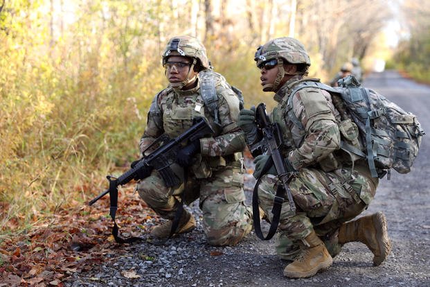 Female Army soldiers IOTV body armor