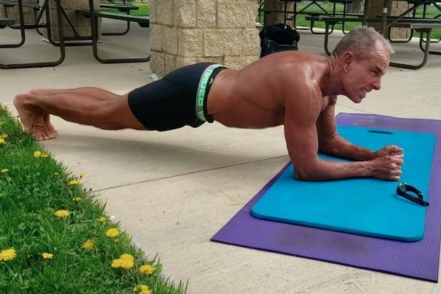 Attempt tent Cyclops 62-Year-Old Retired Marine Breaks Guinness World Record for Planking |  Military.com