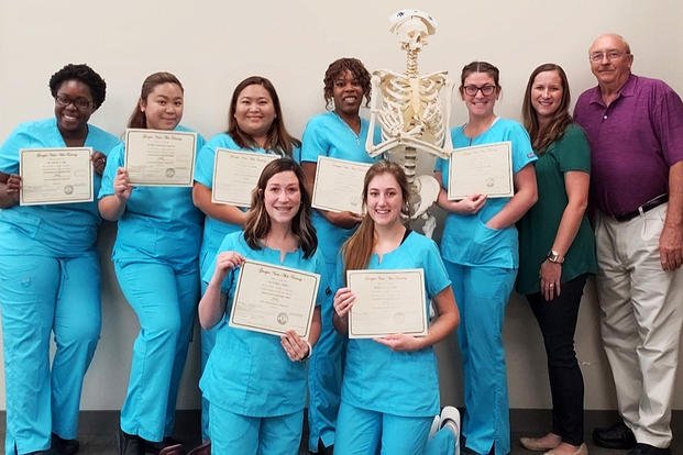 Seven military spouses at Robins recently graduated with their Certified Nursing Assistant licenses