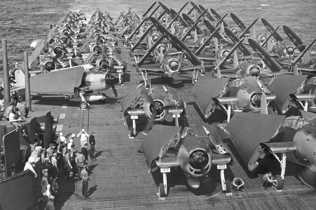 U.S. Avengers, Hellcats, and SBD Dauntless aircraft aboard the USS Intrepid, 1944.