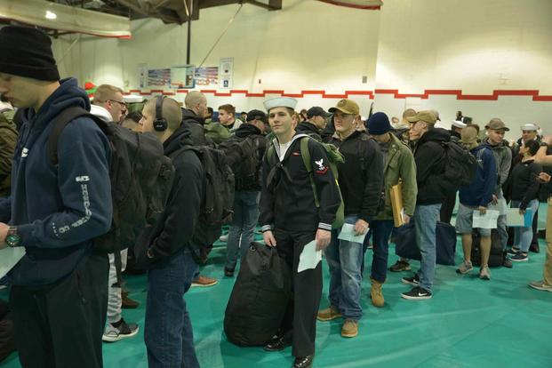 Students at Training Support Center Great Lakes wait patiently in line to leave for the holidays during mass exodus Dec. 20, 2019.