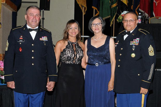 two couples at a ball