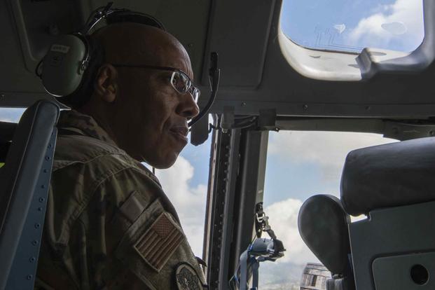 Gen. CQ Brown Jr prepares for a cargo air drop mission on a C-17 Globemaster III.