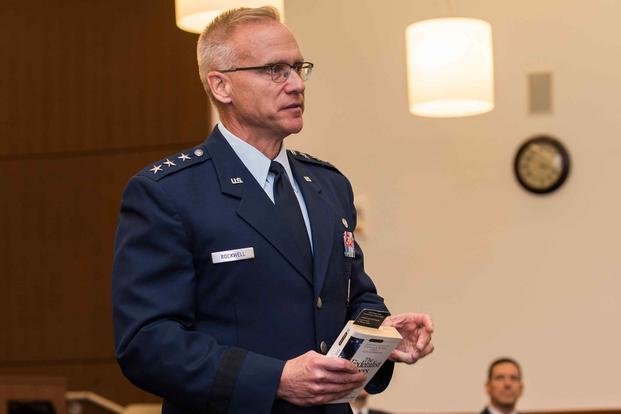 Lt. Gen. Jeffrey A. Rockwell speaks during an investiture ceremony on Joint Base Andrews.