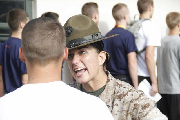 Drill instructor instructs a poolee.