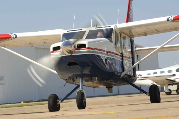 A Civil Air Patrol Gippsland Aeronautics GA-8 "Airvan" accelerates for takeoff in Houston in 2005.