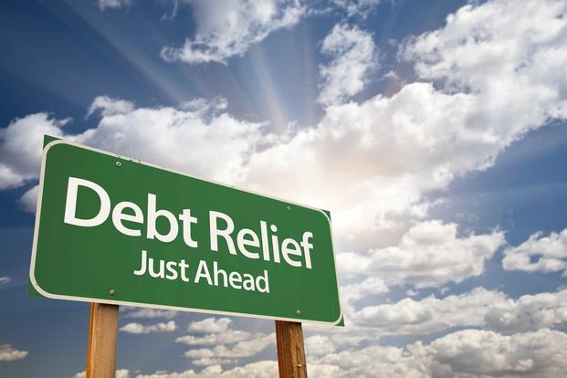 Road sign saying Debt Relief Just Ahead