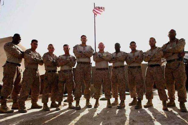 James Martin (far right) with his unit on deployment. 