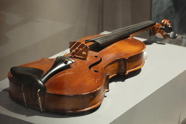 This violin was made from wood scraps by an American held in a German POW camp. (National World War II Museum)