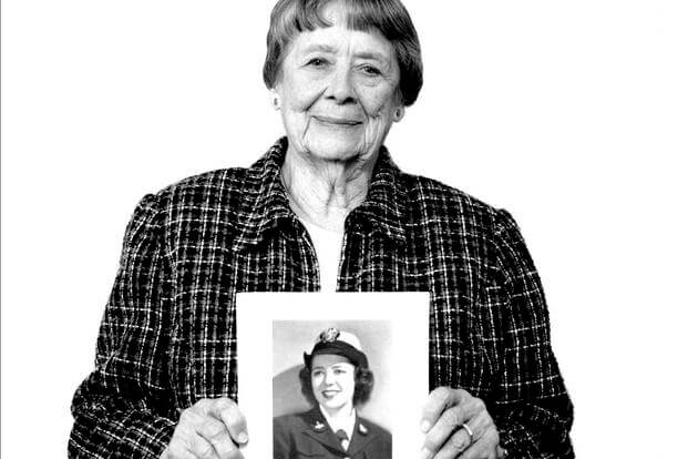 Julia Parsons holds a World War II-era photo of herself.