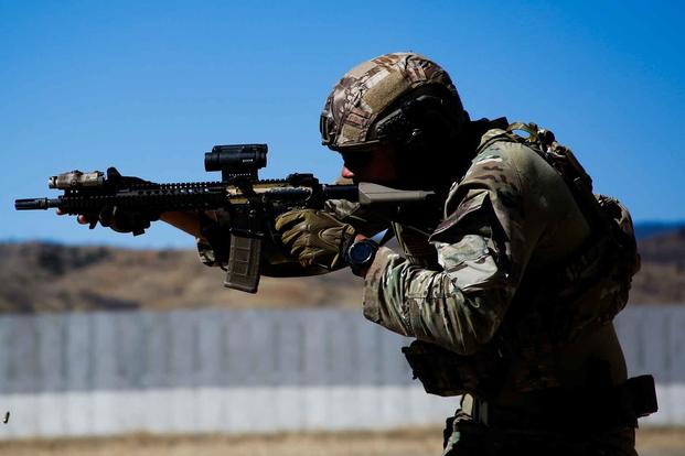 A U.S. Army Special Forces soldier qualifies at a stress shoot range at Ft. Carson,