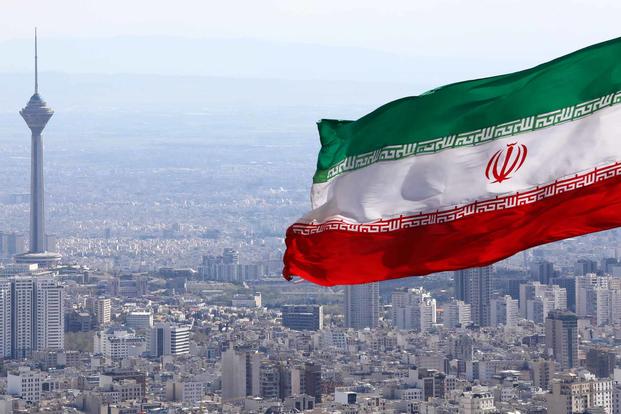 Iran's national flag waves.