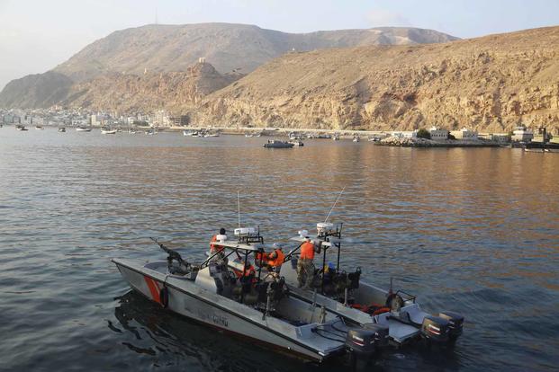 In this Thursday, Nov. 29, 2018, photograph, Yemen coast guard vessels patrol the waters near Mukalla, Yemen. (AP Photo/Jon Gambrell)