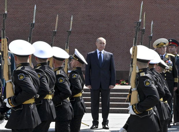 Russian President Vladimir Putin attends a ceremony