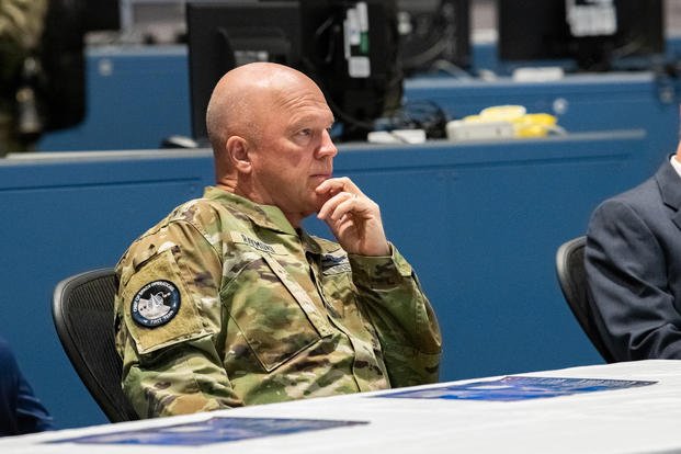 U.S. Space Force Gen. John W. "Jay" Raymond, Chief of Space Operations, watches a presentation