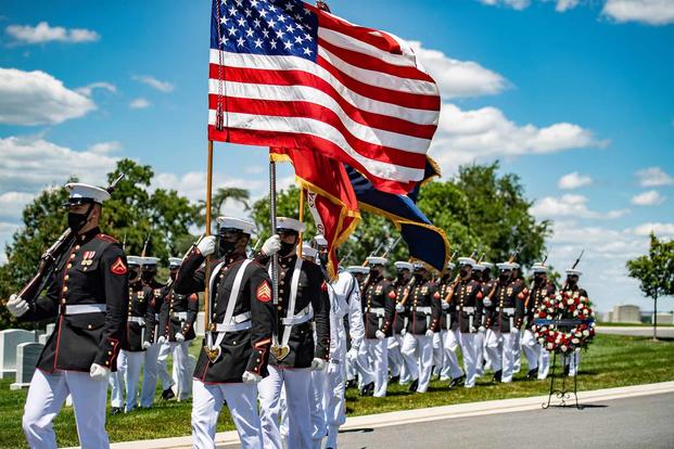Military funeral honors for U.S. Marine Corps 1st Lt. John Warner.