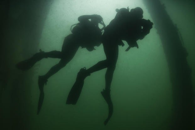 A Navy SEAL conducts a military dive operation.