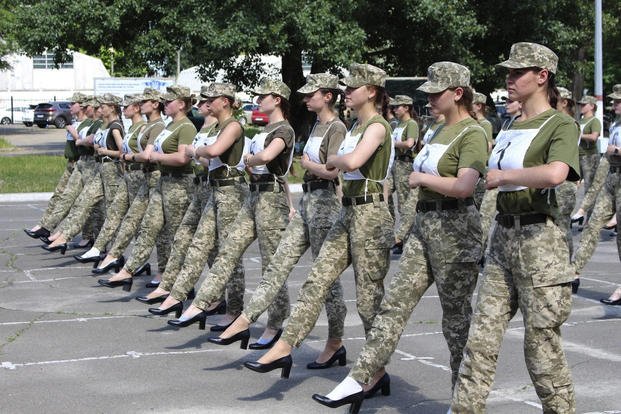 Ukrainian female soldiers wear heels during a military parade rehearsal in Kyiv, Ukraine. 