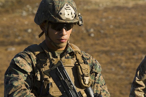 Marine with 2nd Air Naval Gunfire Liaison Company is on patrol.