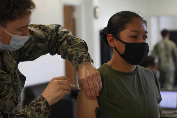 COVID-19 vaccination to an entry-level Marine