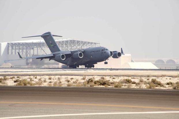 A U.S. Air Force C-17 Globemaster III lands at Al Dhafra Air Base
