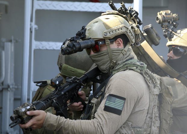 A U.S. Navy SEAL special forces operator during a joint U.S.-Cyprus military drill at Limassol port.