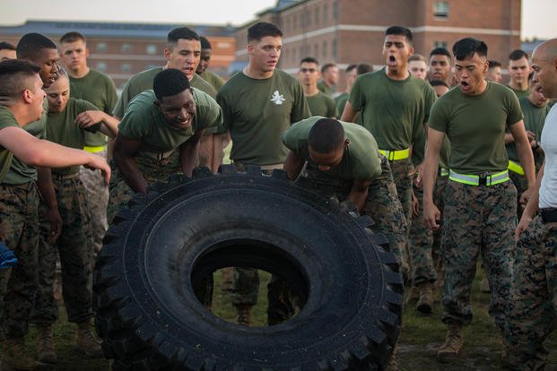 Marines take part in high intensity tactical training relay race.